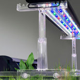 Driamor aquarium light holder in clear acrylic, easy installation blends with tank.