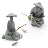 DUZFOREI: pescador sentado en arenisca, ideal para acuario y decoracion zen.