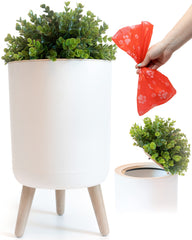 Earth & Mango small outdoor trash can with lid, plant-inspired exterior for discreet waste disposal.