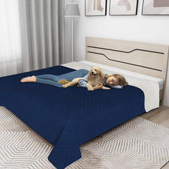 Easy-Going reversible navy and ivory couch cover shows two-color option for style.