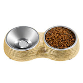 eing double stainless steel dog bowls in gold with rhinestones, front view