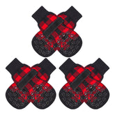 EXPAWLORER dog socks with double-side grips on hardwood floor for secure traction.