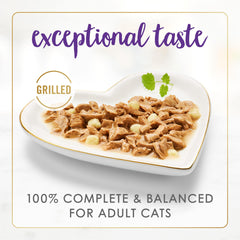 Fancy Feast Delights cheddar-turkey gravy 3oz can close-up showing glossy gravy.