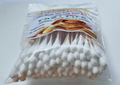 Fast Life Toddy cotton buds shown performing gentle nose cleaning.