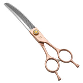 Fenice Peak rose-gold curved thinning scissors close-up showing sharp blades for precise grooming.
