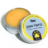 Finn Paw Hero balm bottle closeup showing natural paw protection for winter