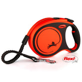 Flexi Xtreme orange tape leash extended for long-range control and comfortable walks.