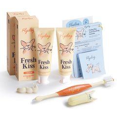FlyDog Fresh Kiss toothpaste tube demonstrates daily dental care with enzymatic formula
