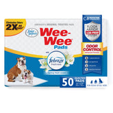 Four Paws Wee-Wee odor-control pads closeup showing absorption and Febreze freshness