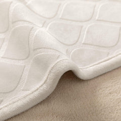 fuguitex reversible double-sided plush velvet blanket in cozy home setting