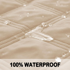Fuguitex waterproof dog blanket on khaki couch offers reversible color and cozy protection.