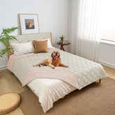 Fuguitex waterproof dog blanket pink-cream folded to protect furniture and stay ready