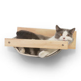 FUKUMARU hammock wall-mounted cat bed during assembly for secure mounting