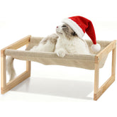 FUKUMARU large elevated pet bed with wooden frame offers relaxed lounging.
