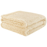 furrybaby dog blanket on sofa shows cozy warmth with plush sherpa fleece