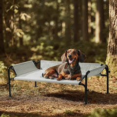 Gardner Pet elevated dog bed guardrail side view showing secure outdoor lounging