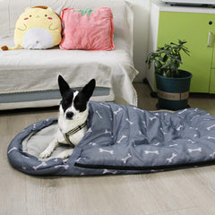 GeerDuo dog sleeping bag with waterproof outer keeps your pet dry on wet ground.
