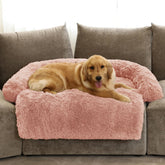 GGIB Calming Dog Bed curved design pink for restful sleep.