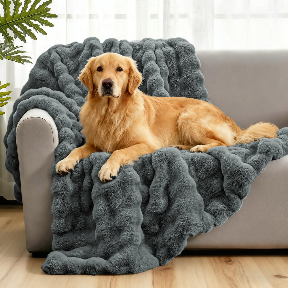 Giaousin waterproof dog blanket on sofa showing plush faux rabbit fur warmth