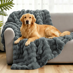 Giaousin waterproof dog blanket on sofa showing plush faux rabbit fur warmth