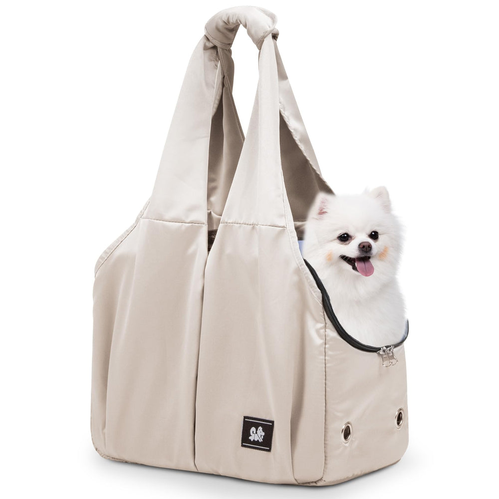 Gisaryc dog purse carrier front view with accessible pockets for travel essentials.