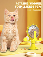 GLOGLOW treat-dispensing cat toy releasing snacks during slow, engaging play