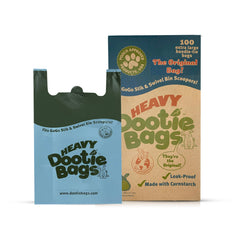 GoGo Stik heavy dootie bags in dispenser box ready for quick, hygienic disposal.