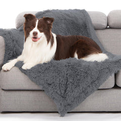 Gogobunny waterproof dog blanket on a sofa protecting furniture from spills