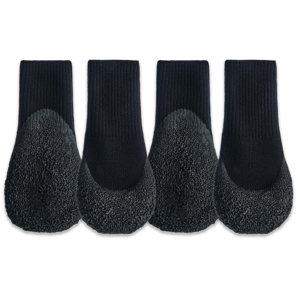 Goo-eez Lites Black 2XS on a dog walk, cozy protection during outdoor adventures.