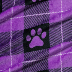 GreaterGood paw-print purple crate-use blanket creates a familiar, comforting space in a crate.