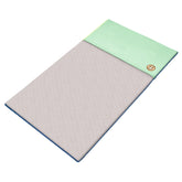 GuineaDad Original Cage Liner sea-green with burrowing pocket for a cozy dry habitat.