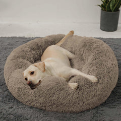 HACHIKITTY calming donut bed outer view in taupe for large dogs, inviting curling comfort.