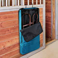 Harrison Howard bridle bag teal inner compartment view organized tack storage.