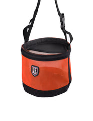 Harrison Howard muzzle bag with orange neck strap keeps feeding secure during rides.