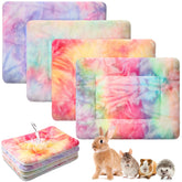 Haull tie-dyed guinea pig bed folded showing cozy foldable liner for travel.