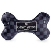 Haute Diggity Dog Black Checker Chewy Vuiton Bone closeup with squeaker for interactive play.