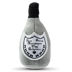 Haute Diggity Dog Champagne Perignonn plush toy in action during dog play.