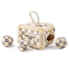 Haute Diggity Dog Checker Chewy Vuiton trunk toy—a stylish plush puzzle for interactive play.