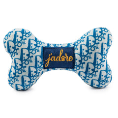 Haute Diggity Dog Dogior Bone showing built-in squeaker for interactive play.
