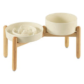 Havniva ceramic raised slow feeder bowl set on wooden stand supports comfortable dining.