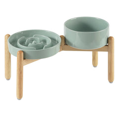 Havniva ceramic raised slow-feeder bowl with wooden stand for elevated feeding.