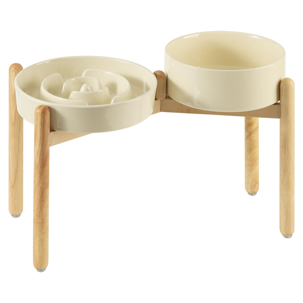 Havniva raised ceramic bowl on wooden stand promotes comfortable feeding posture.