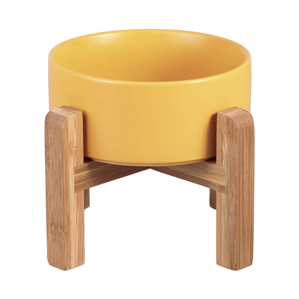 HCHLQLZ ceramic elevated cat bowl on wood stand reduces spills during meals.