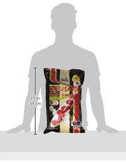 Hikari Hi Growth Large bag with scoop shown for controlled feeding.