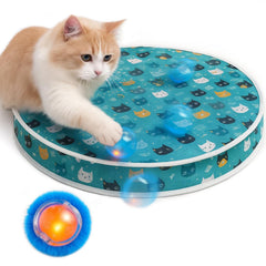Huimpet interactive cat toy on teal mat with motion balls for indoor enrichment.
