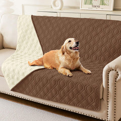 hyha waterproof dog bed blanket folded on a couch demonstrates triple waterproof protection for furniture