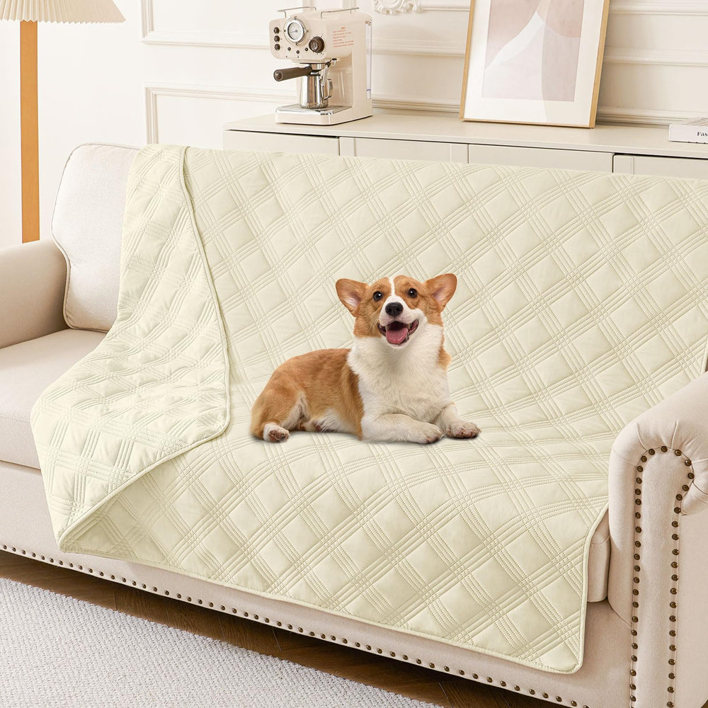 hyha waterproof dog blanket on beige sofa protects furniture from spills.