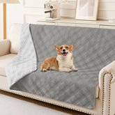 hyha waterproof dog blanket in grey on sofa shows moisture protection