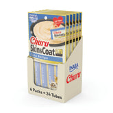 INABA Churu tuna tube in hand for quick, hydrating cat treat.