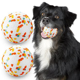 JEROCK dog ball in action shows bite-resistant durability for aggressive chewers.